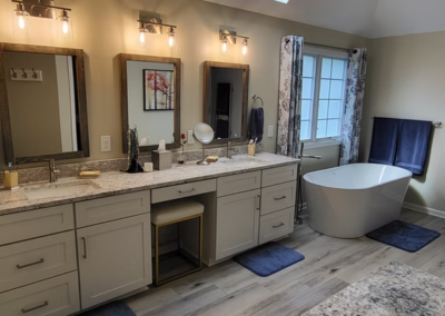COUNTRY WALK BATHROOM REMODEL - After, vaulted ceilings, skylight, standalone tub, granite countertop, LVT flooring